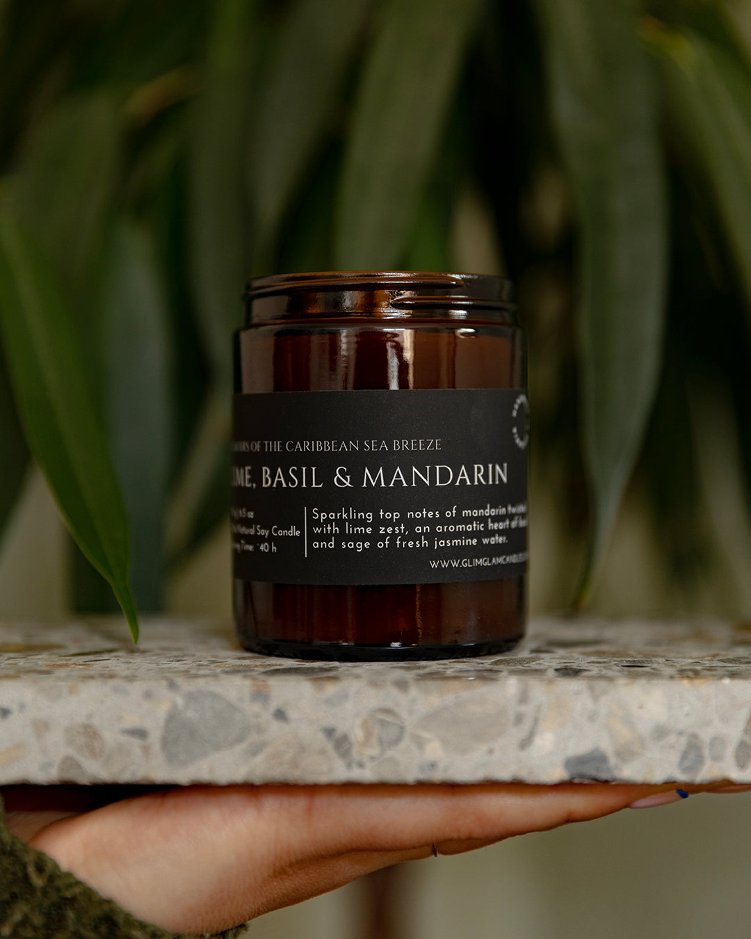 Lifestyle image representing the Amber Soy Candles Collection by Glim & Glam, featuring handcrafted soy candles in a warm, nature-inspired home setting.