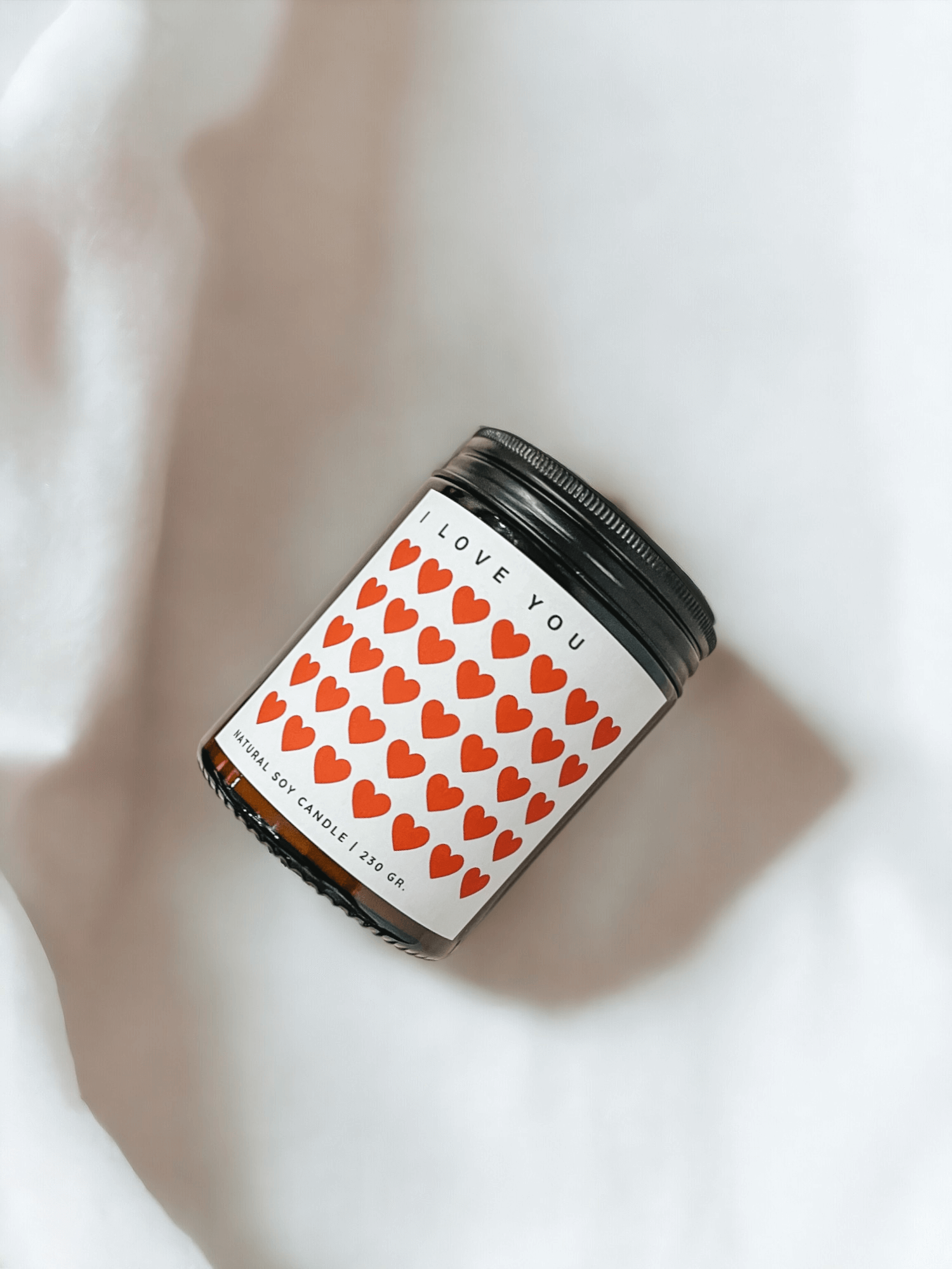 Lifestyle image representing the Occasion Soy Candles Collection by Glim & Glam, featuring handcrafted soy candles in a warm, nature-inspired home setting.