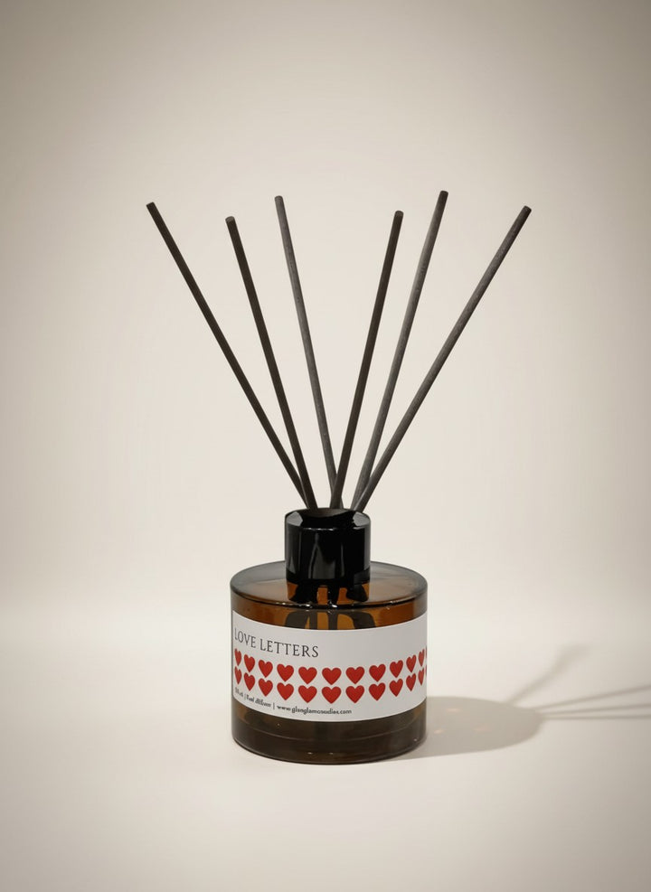 LOVE LETTERS REED DIFFUSER in black matte 100 ml bottle, long-lasting luxury home fragrance by Glim Glam