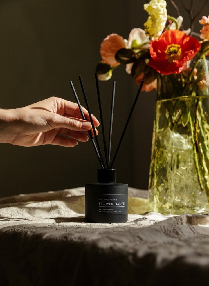 FLOWER DANCE REED DIFFUSER in amber 100 ml bottle, long-lasting luxury home fragrance by Glim Glam