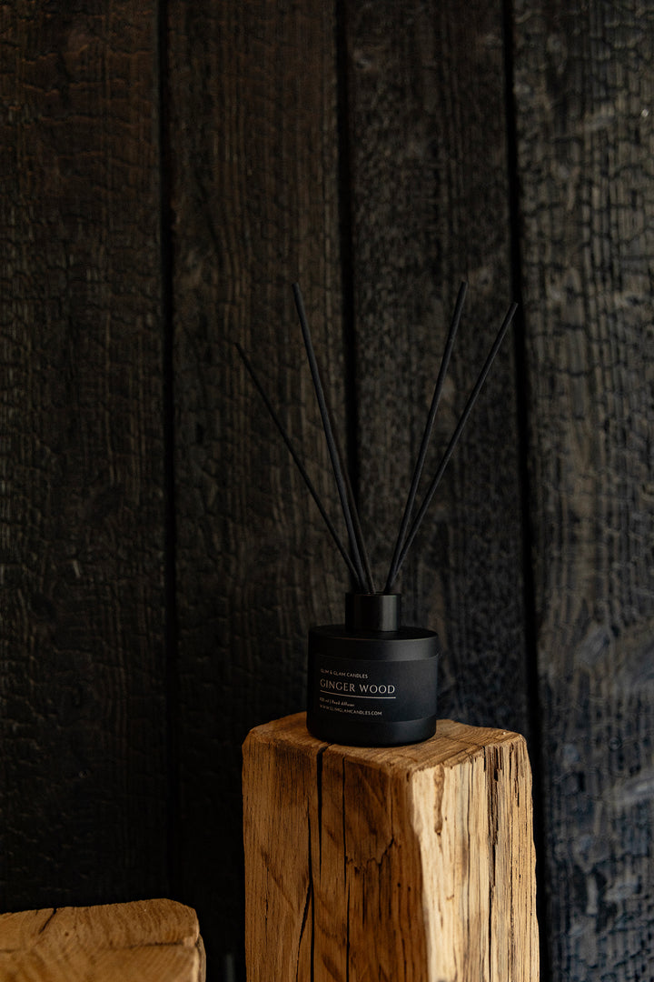 GINGER WOOD REED DIFFUSER in amber 100 ml bottle, long-lasting luxury home fragrance by Glim Glam