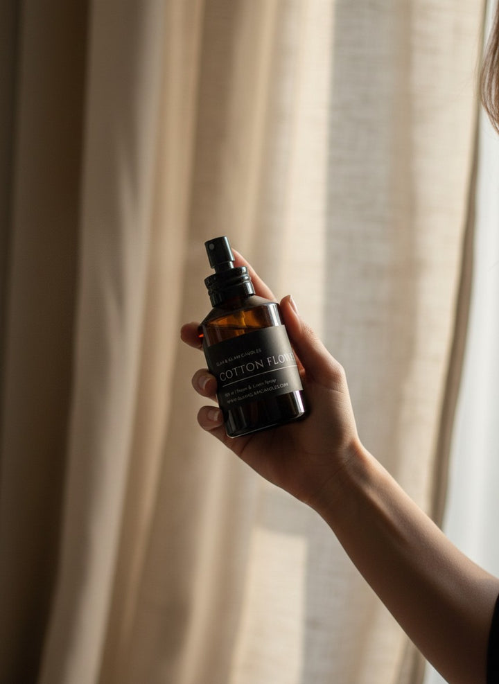 COTTON FLOWER ROOM AND FABRIC SPRAY in amber bottle for refreshing home fragrance by Glim Glam