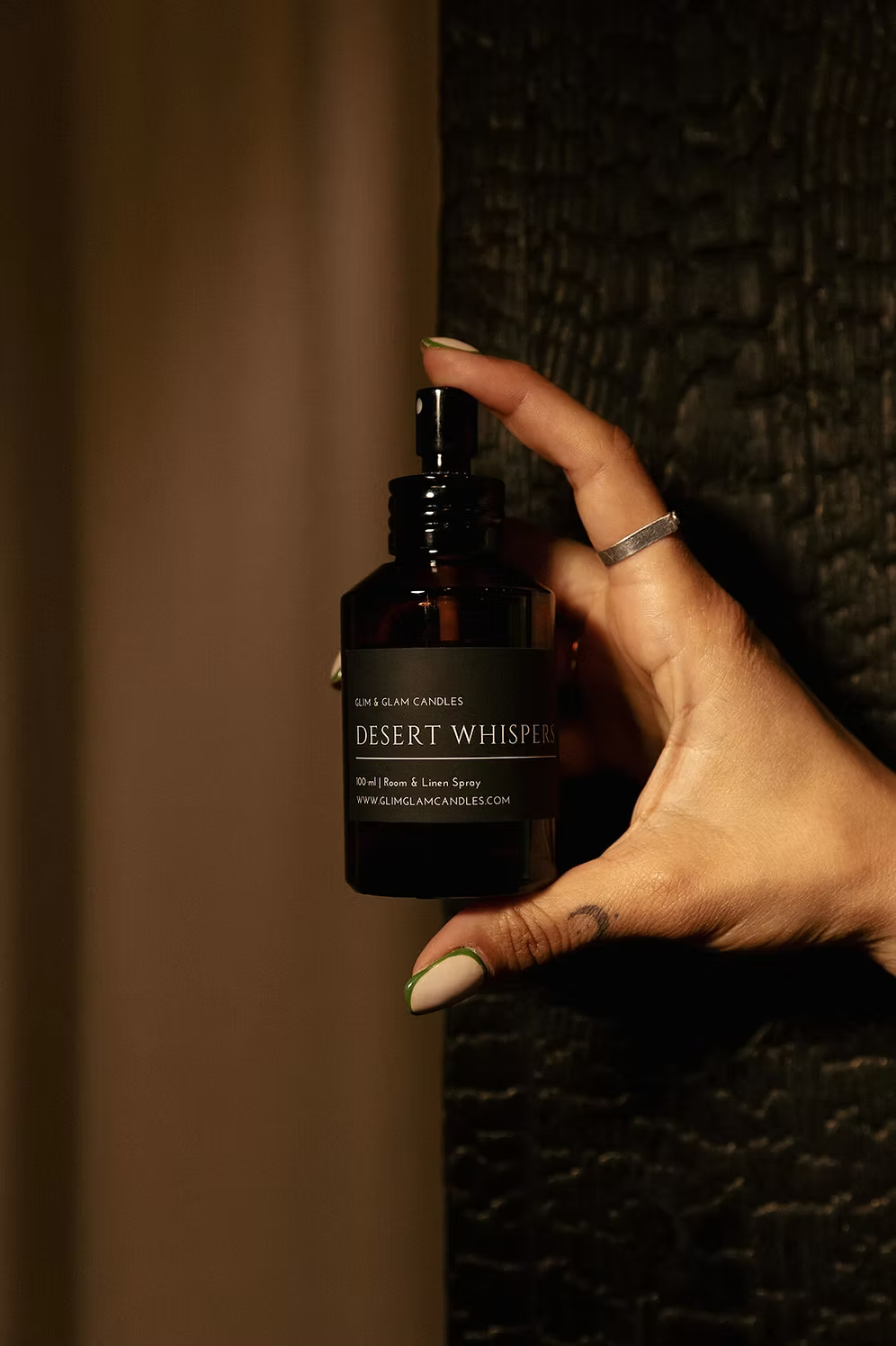 DESERT WHISPERS ROOM AND FABRIC SPRAY in amber bottle for refreshing home fragrance by Glim Glam