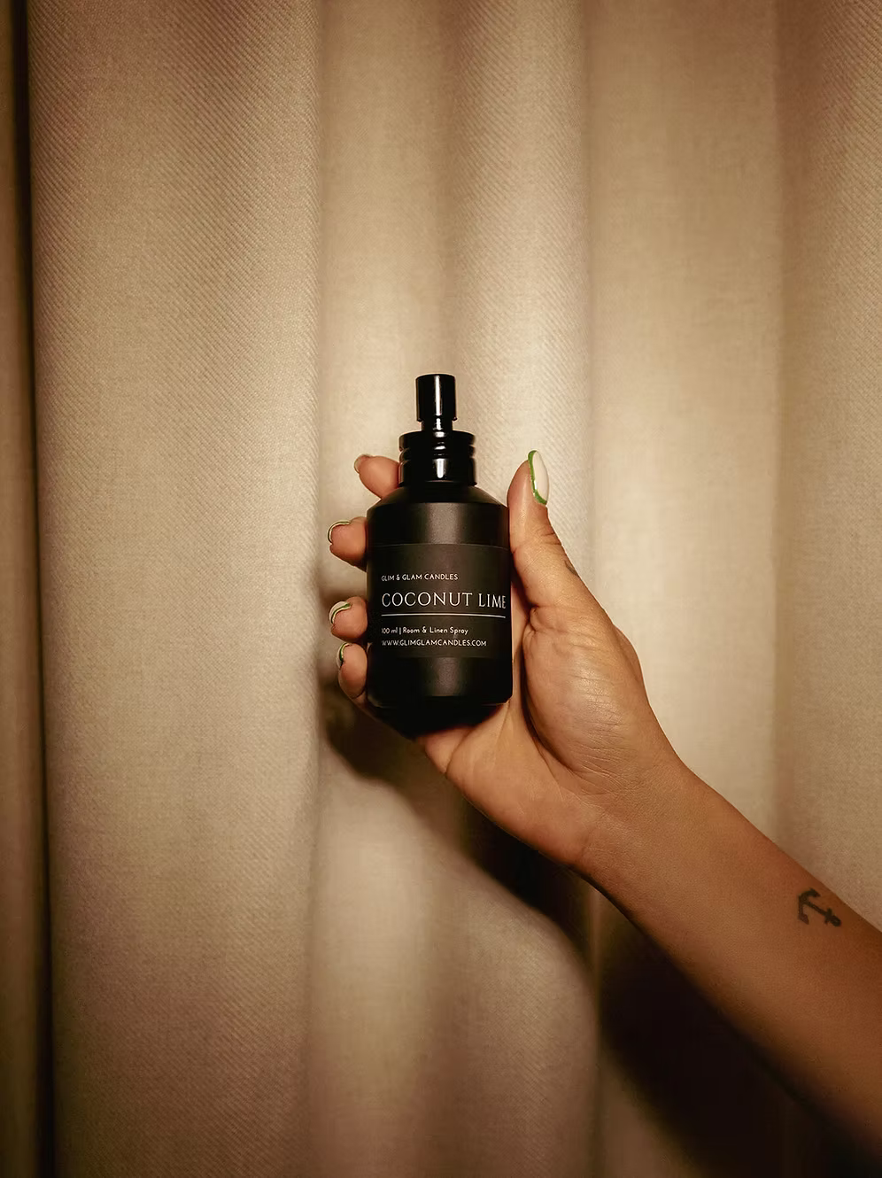 COCONUT LIME ROOM AND FABRIC SPRAY in amber bottle for refreshing home fragrance by Glim Glam