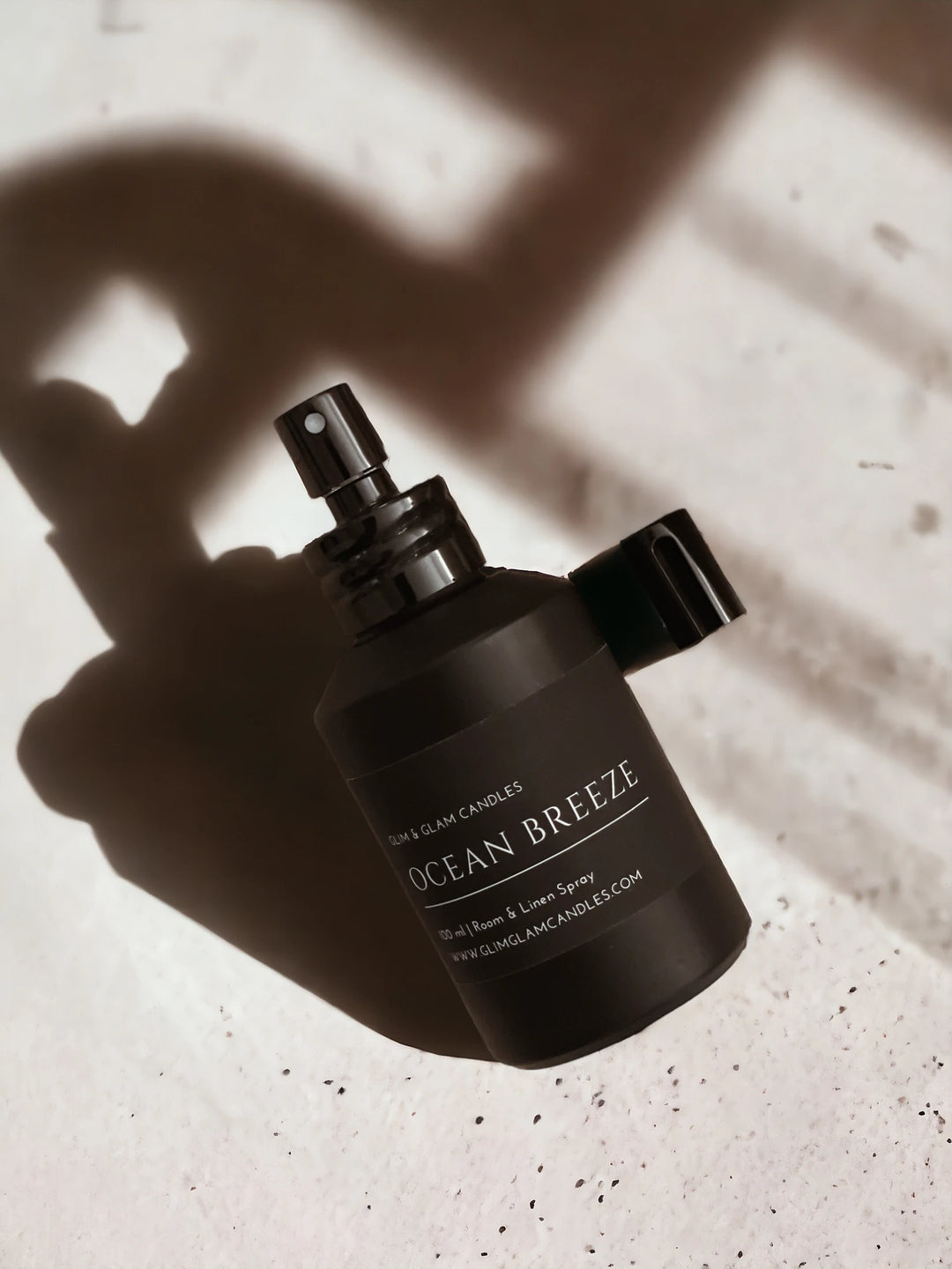 OCEAN BREEZE ROOM AND FABRIC SPRAY in black glossy bottle for refreshing home fragrance by Glim Glam