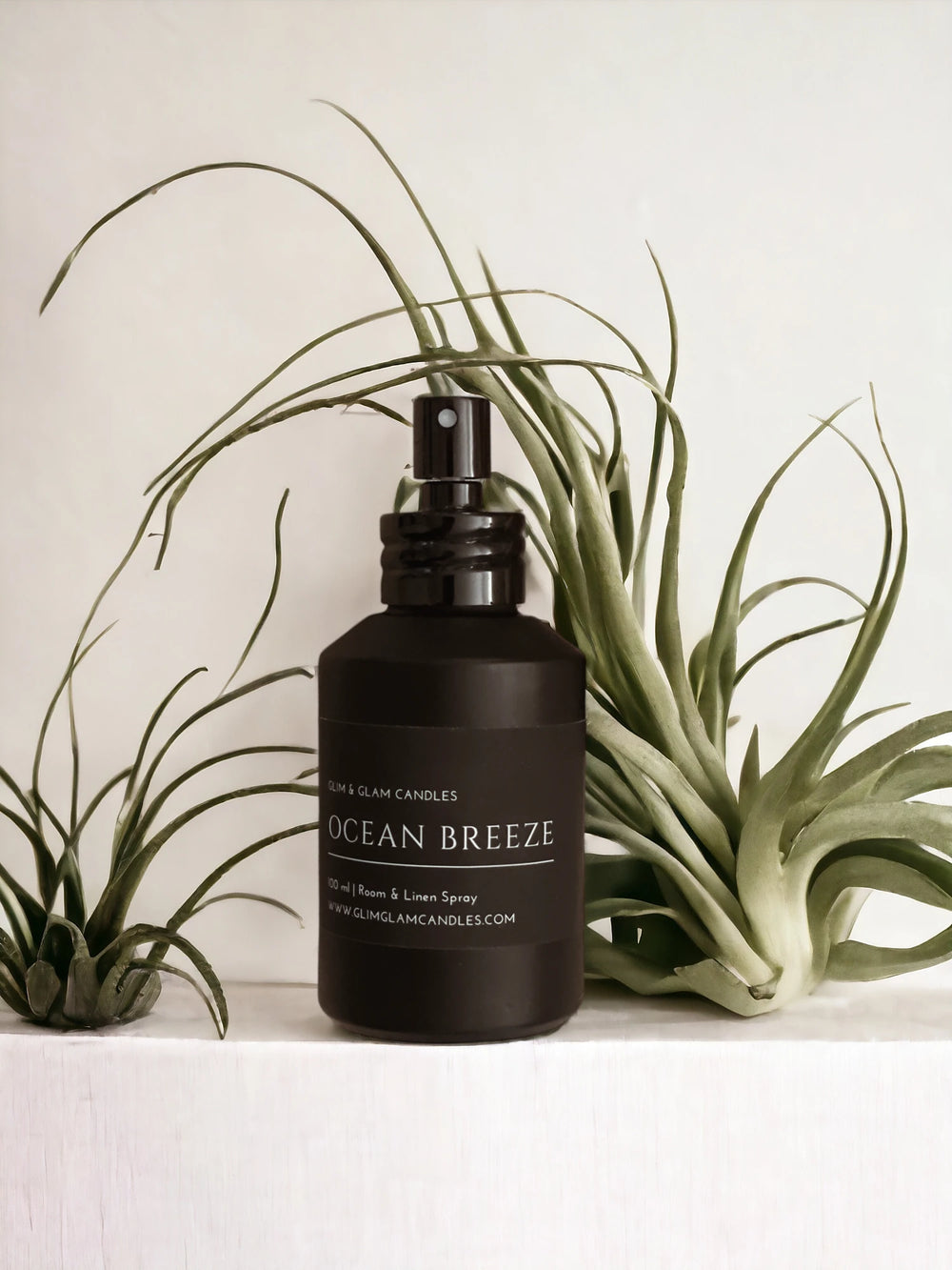 OCEAN BREEZE ROOM AND FABRIC SPRAY in amber bottle for refreshing home fragrance by Glim Glam