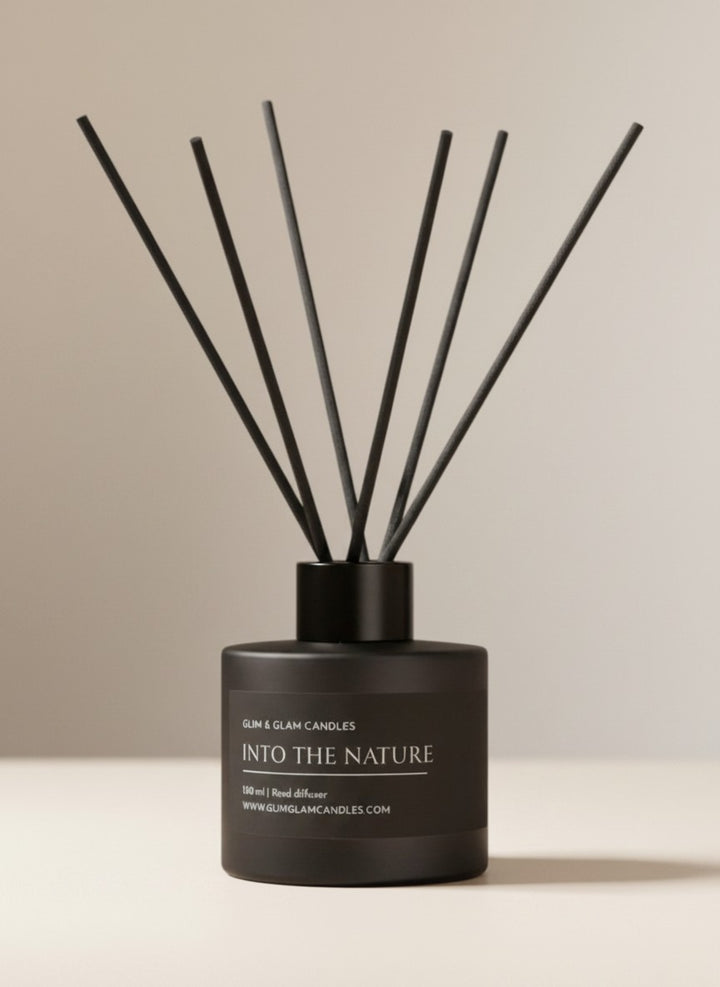 INTO THE NATURE REED DIFFUSER in black matte 100 ml bottle, long-lasting luxury home fragrance by Glim Glam