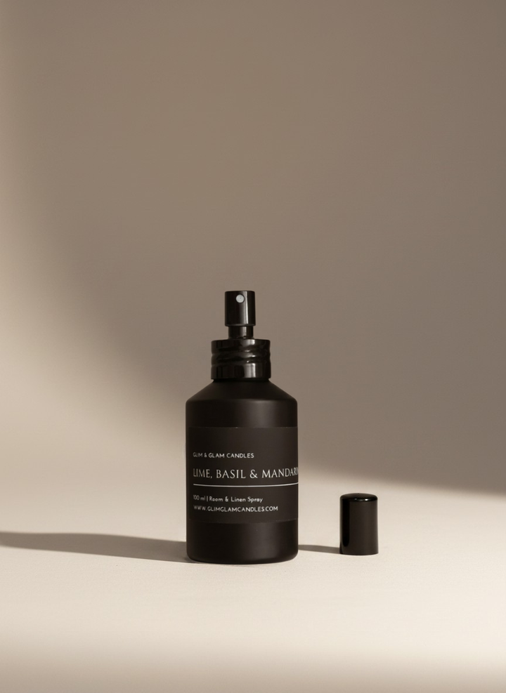LIME, BASIL & MANDARIN LIME ROOM AND FABRIC SPRAY in black matte bottle for refreshing home fragrance by Glim Glam
