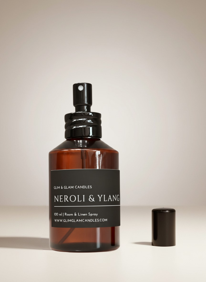 NEROLI & YLANG YLANG ROOM AND FABRIC SPRAY in black glossy bottle for refreshing home fragrance by Glim Glam