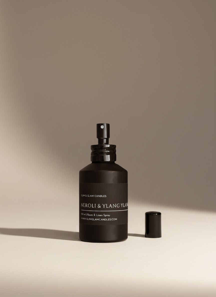 NEROLI & YLANG YLANG ROOM AND FABRIC SPRAY in black matte bottle for refreshing home fragrance by Glim Glam