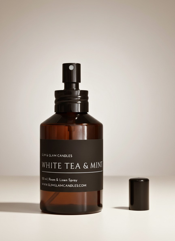 WHITE TEA & MINT ROOM AND FABRIC SPRAY in black glossy bottle for refreshing home fragrance by Glim Glam
