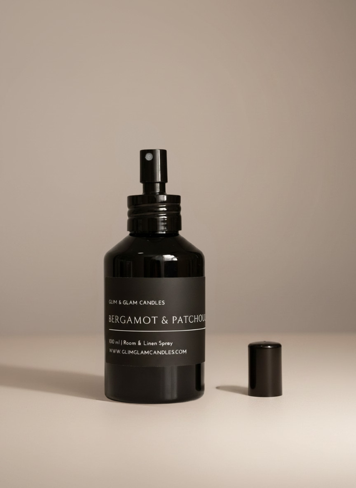 BERGAMOT & PATCHOULI ROOM AND FABRIC SPRAY in black glossy bottle for refreshing home fragrance by Glim Glam