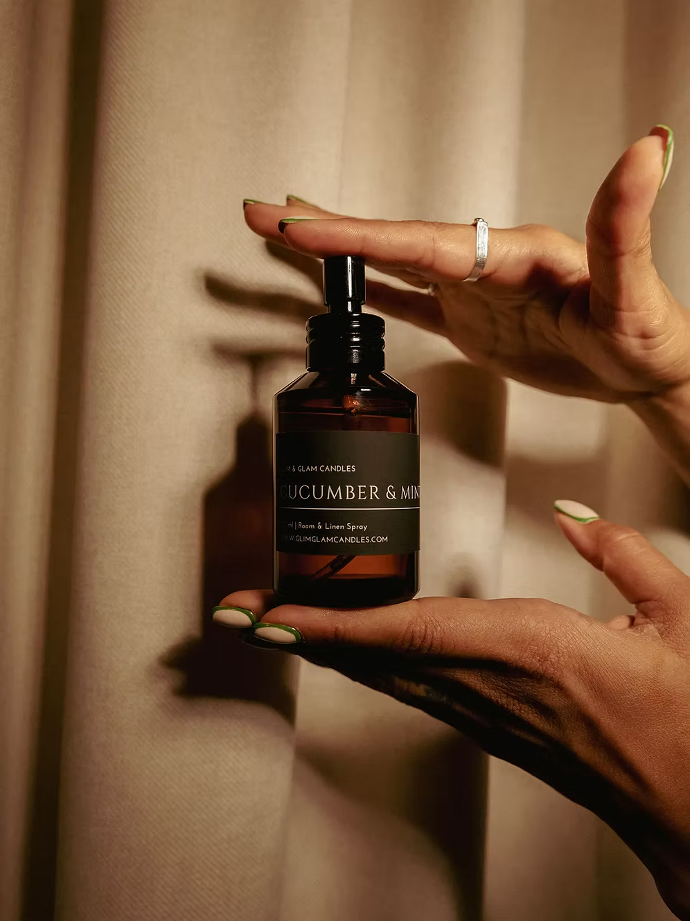 CUCUMBER & MINT ROOM AND FABRIC SPRAY in amber bottle for refreshing home fragrance by Glim Glam