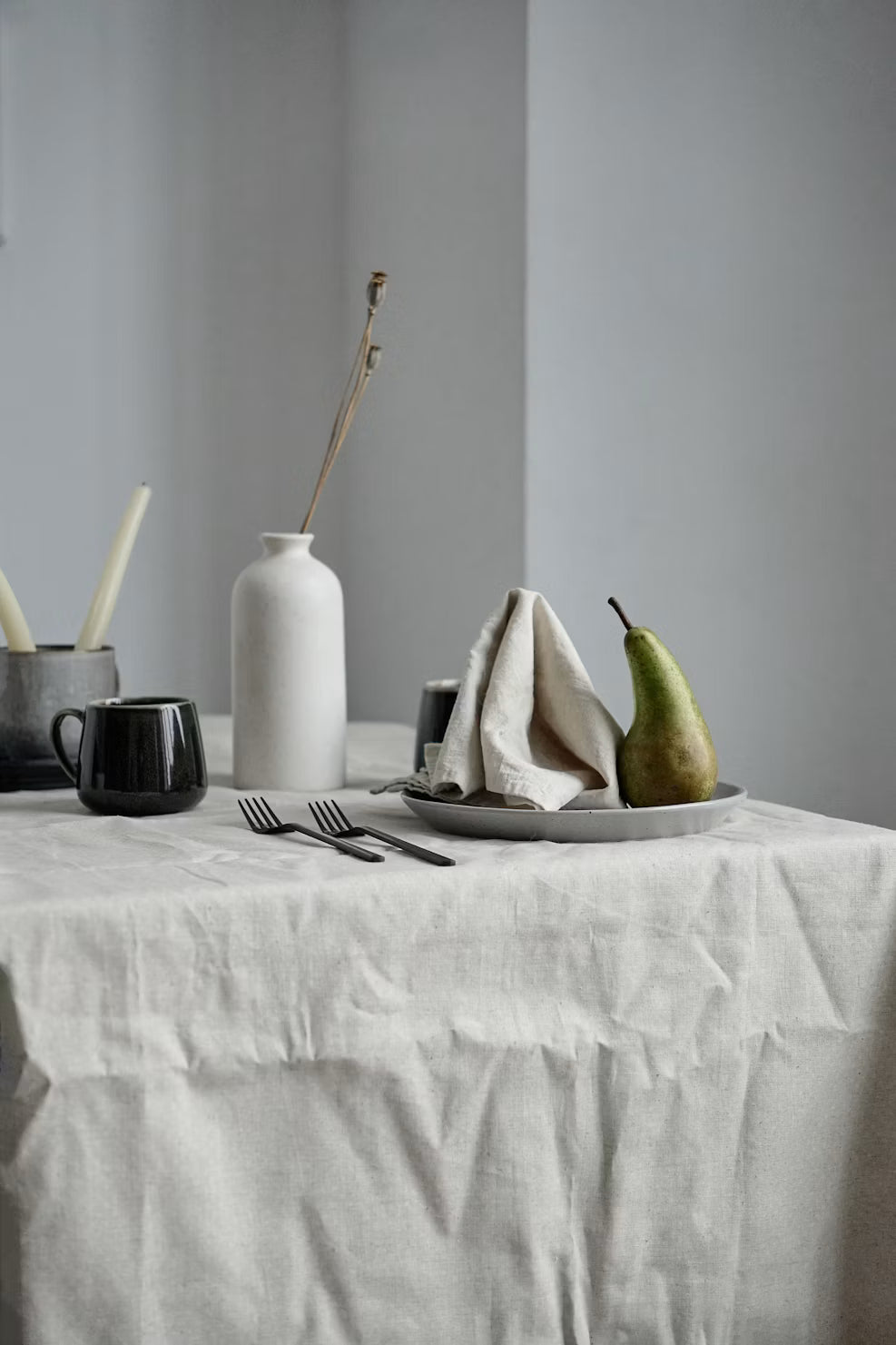 Bright dining room with seasonal fruits and natural daylight, perfect for fruity home fragrances.