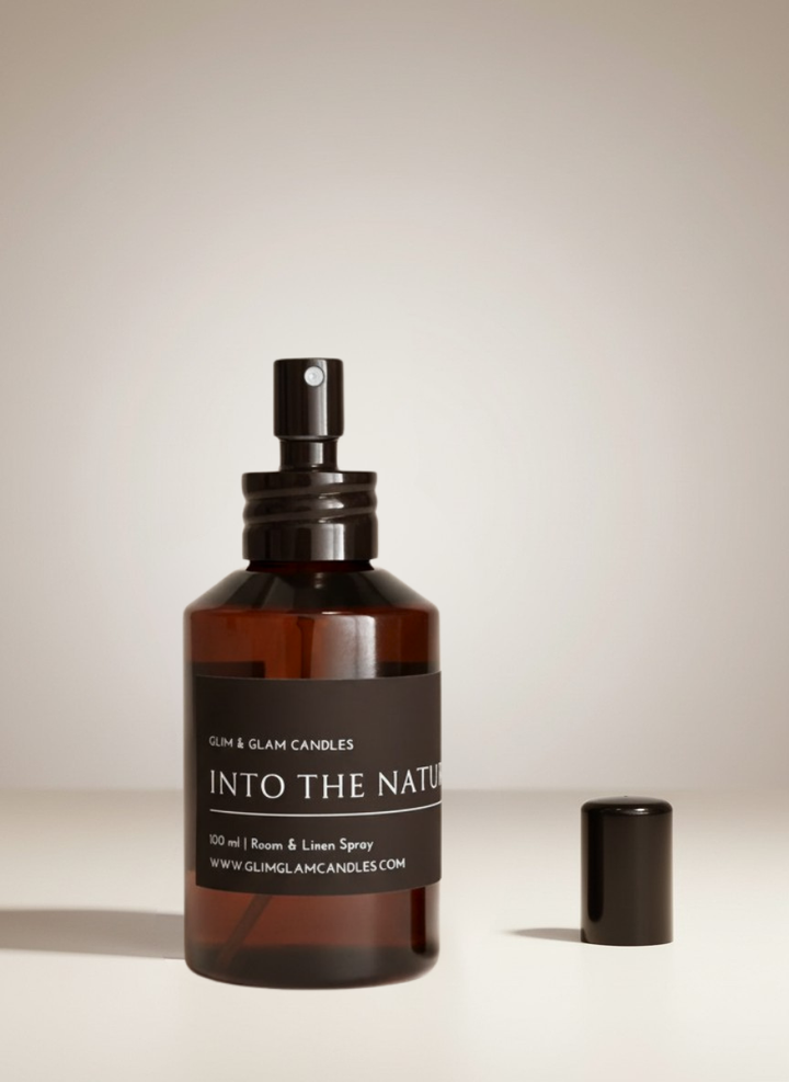 INTO THE NATURE ROOM AND FABRIC SPRAY in black glossy bottle for refreshing home fragrance by Glim Glam