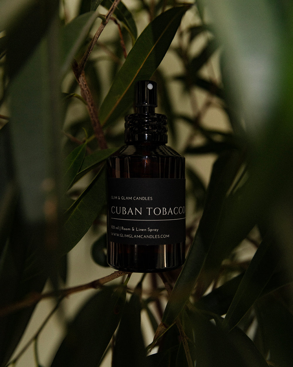 CUBAN TOBACCO & OAK ROOM AND FABRIC SPRAY in amber bottle for refreshing home fragrance by Glim Glam
